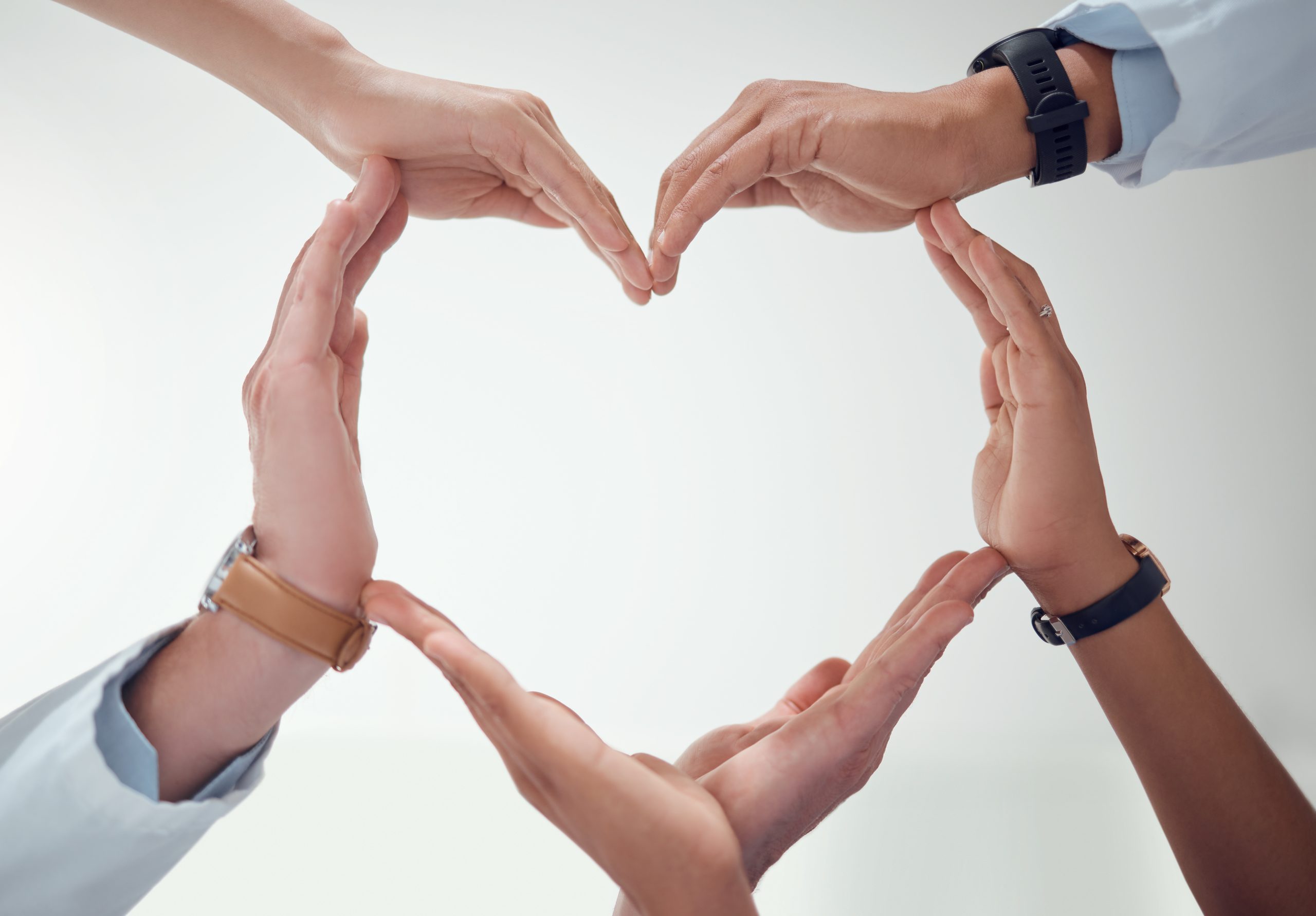 Heart, teamwork or hands of doctors with support in collaboration for healthcare wellness together. Closeup, love shape or medical nurses with group solidarity, integrity or mission with mockup space.